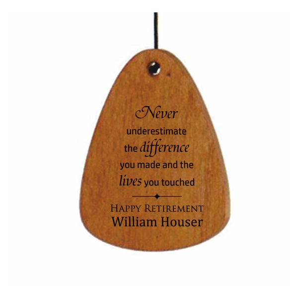 Detailed image of the Festival wind chime wind sail engraved with retirement saying: Never underestimate the difference you made and the lives you touched. 