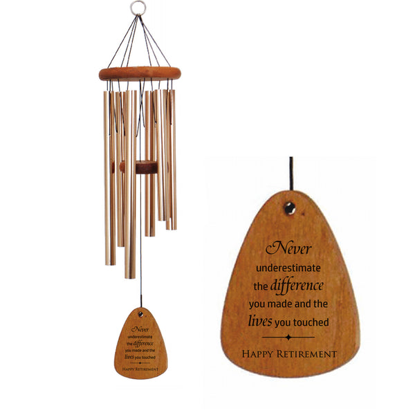 Wooden wind chime with personalized retirement message on a white background. Chime has redwood accents and bronze tubes.