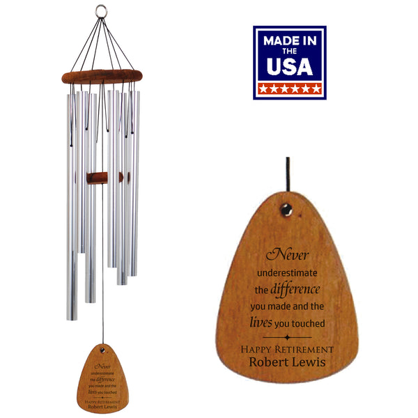Wood wind chime with silver tubes on a white background.  Wind sail engraved with retirement saying "Never underestimate the difference you made and the lives you touched." with name personalization.